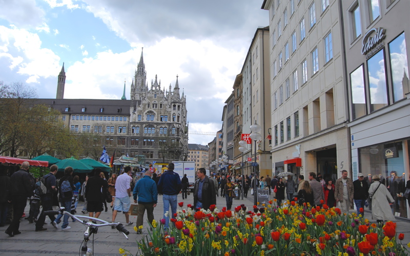 3 - A busy pedestrian area in Marienplatz, Munich, featuring the iconic New Town Hall in the background